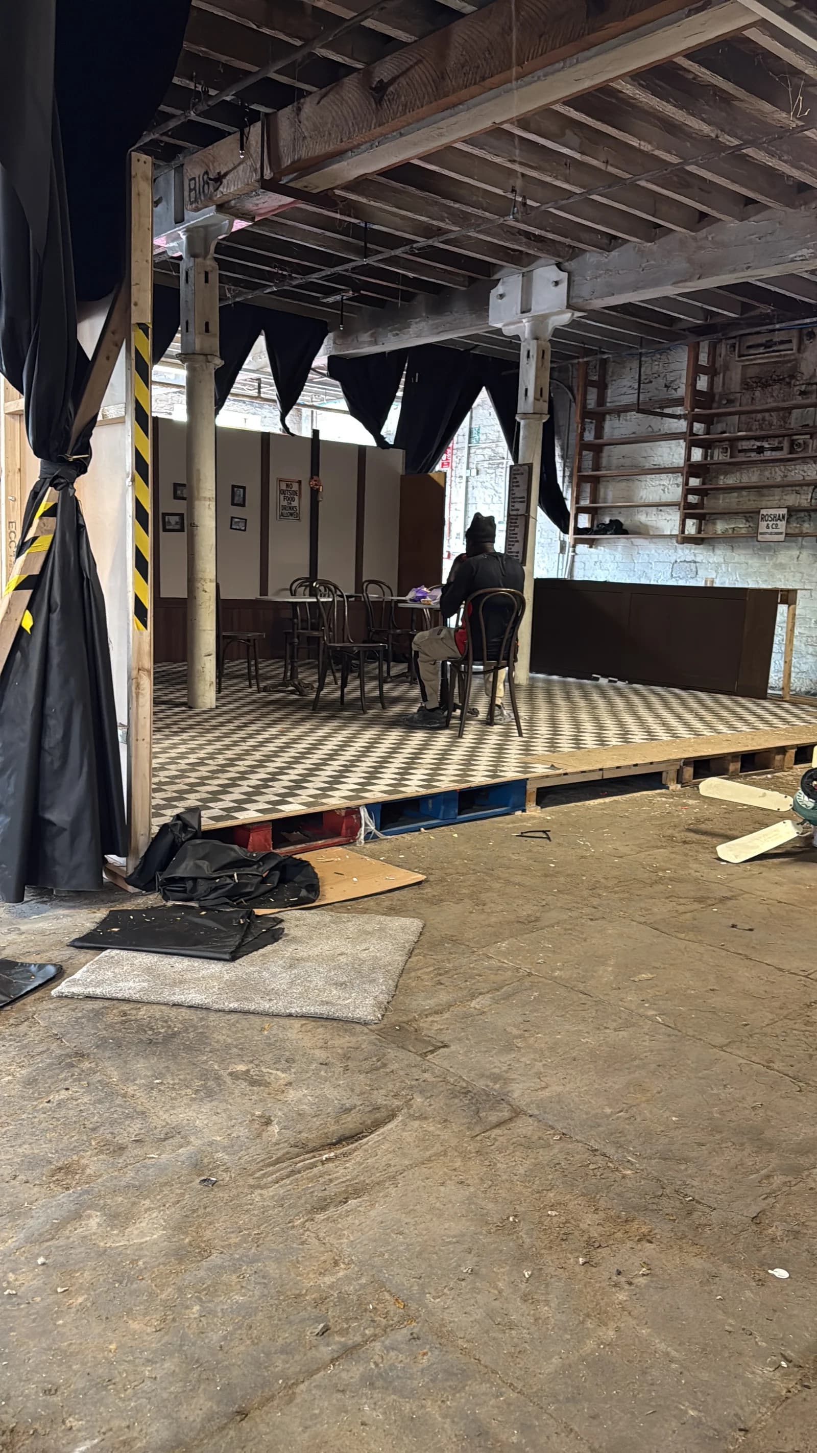 Curtained studio pods being fitted inside the mill