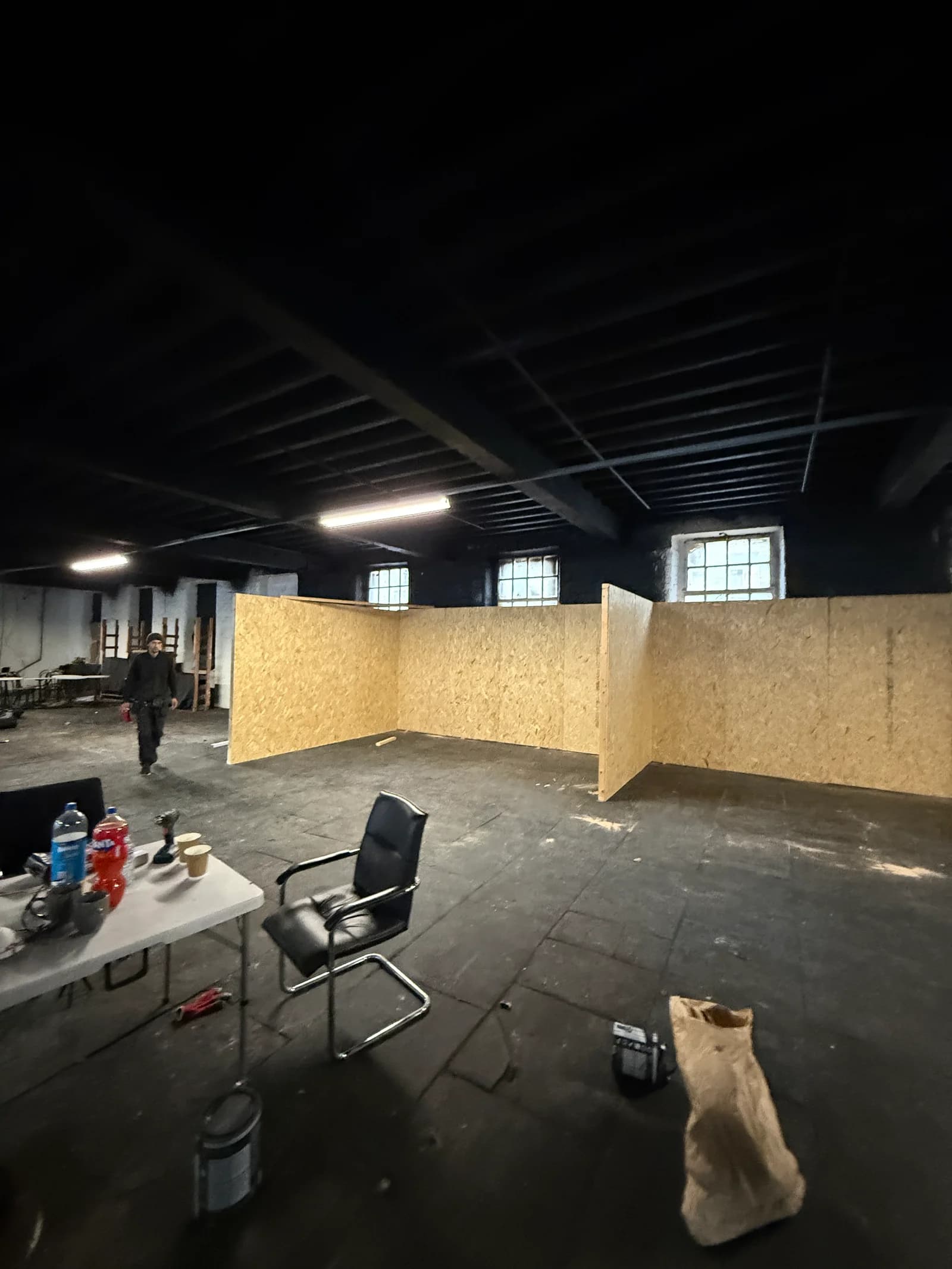Studio partition walls under construction on the mill floor